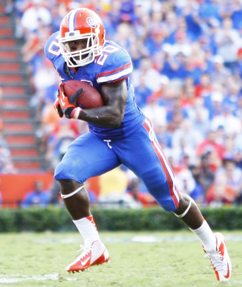 Redshirt senior Omarius Hines runs toward the sideline during UF’s 14-6 victory against LSU on Saturday at Ben Hill Griffin Stadium.