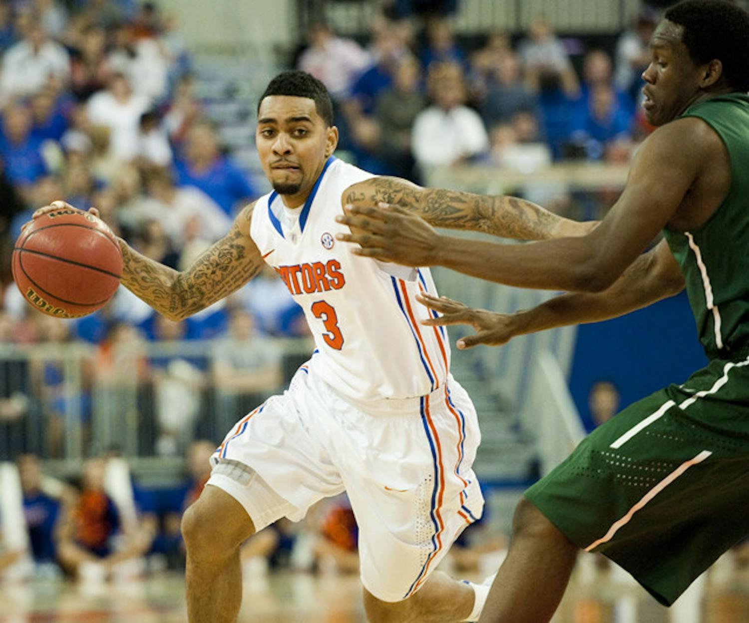 Florida junior guard Mike Rosario said he is still adjusting to his role with the Gators after sitting out for a year following his transfer from Rutgers.
