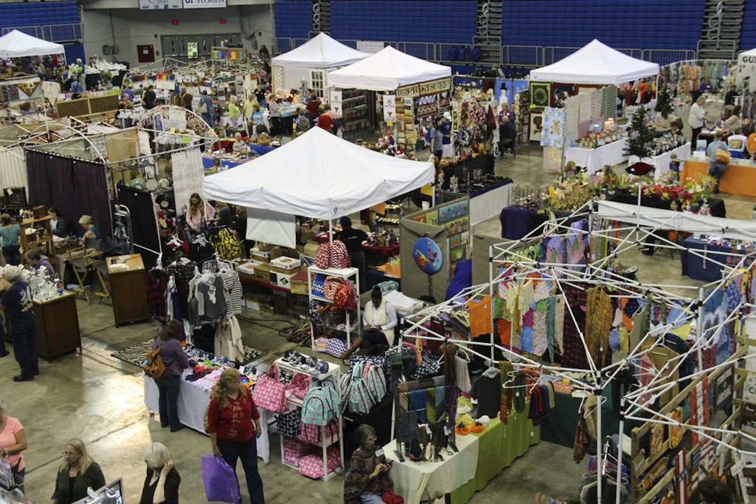 People gather in the O'Connell Center for the 2015 Craft Festival on Dec. 6, 2015.