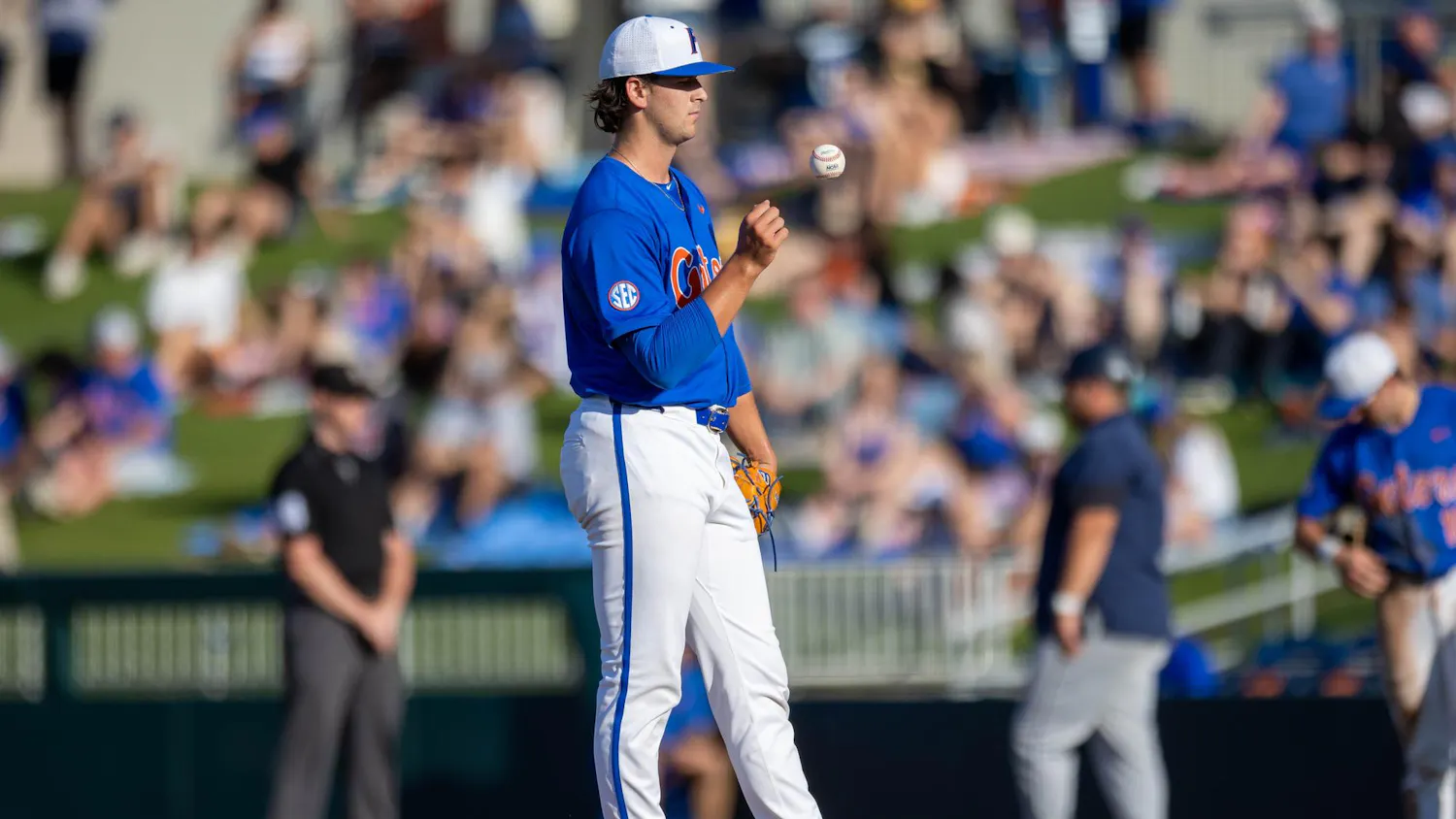 Florida right-handed pitcher Liam Peterson (12) tosses the ball during an NCAA college baseball game against Auburn at Condron Family Ballpark in Gainesville, Fla., Friday, April 17, 2026.