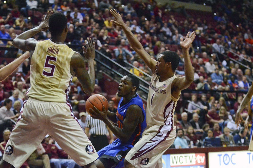 Michael Frazier II drives into the paint during Florida's 65-63 loss to Florida State on Dec. 30 in Tallahasee.