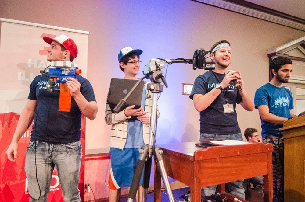 UF students Troy Gittelmacher, Jean-Ralph Aviles, Bernard Marger and Georgia Institute of Technology student Faizan Virani, show their invention, Gun Loc, a device that uses an app to alert gun owners whenever their gun has been moved, at Microsoft’s 2016 U.S. Imagine Cup competition in San Francisco.