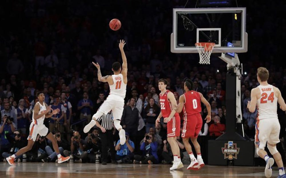 <p dir="ltr">Chris Chiozza takes the final shot of Florida’s 84-83 win against Wisconsin in the Sweet 16 of the NCAA Tournament on March 24, 2017, at Madison Square Garden.</p>