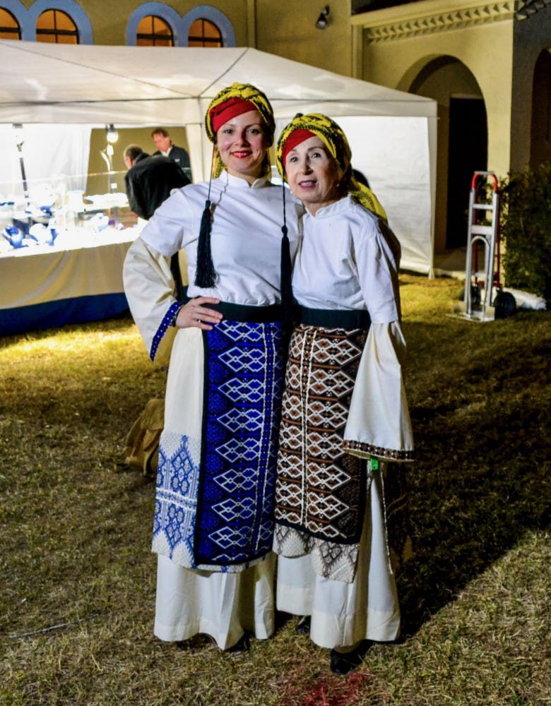 Massina Arvanitis, from Canada, and Olga Petrovic, from Gainesville, sport traditional western Greek attire from the 1800s at the Gainesville Greek Festival. They helped put on this festival to maintain their culture and to fundraise for the St. Elizabeth Greek Orthodox Church.
&nbsp;