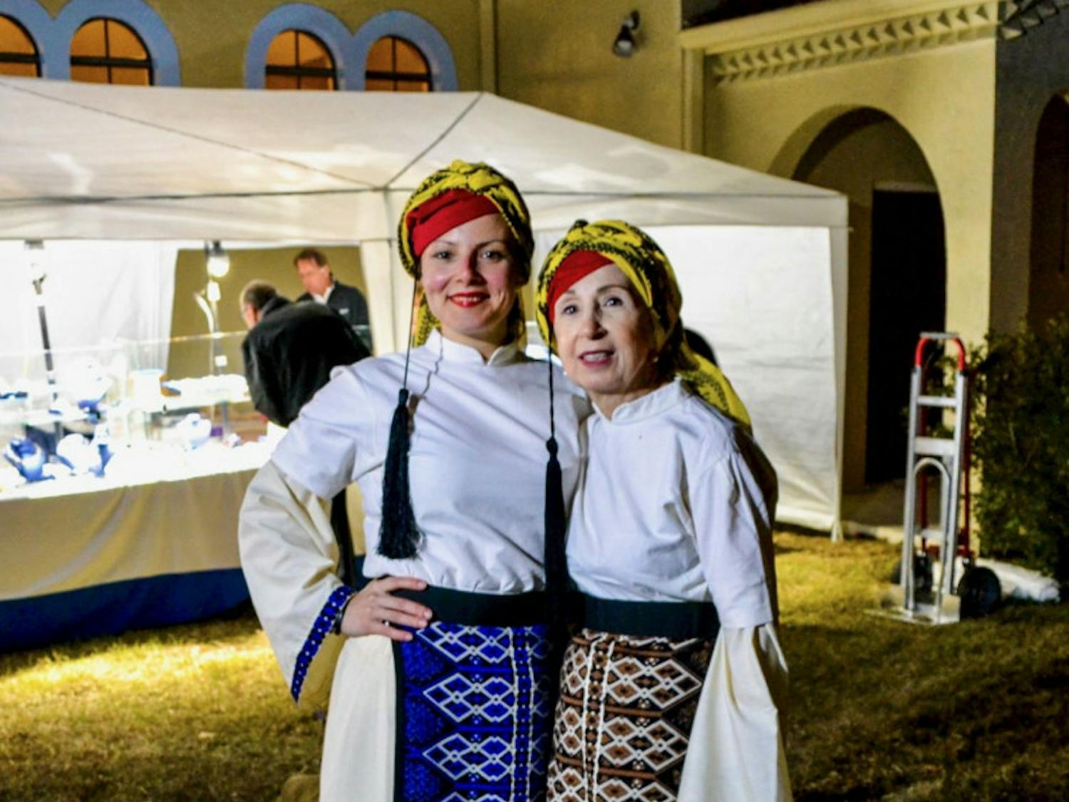 Massina Arvanitis, from Canada, and Olga Petrovic, from Gainesville, sport traditional western Greek attire from the 1800s at the Gainesville Greek Festival. They helped put on this festival to maintain their culture and to fundraise for the St. Elizabeth Greek Orthodox Church.
&nbsp;