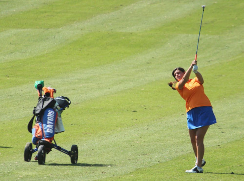 <p>Maria Torres hits the ball during the SunTrust Gator Women’s Golf Invitational on March 15.</p>