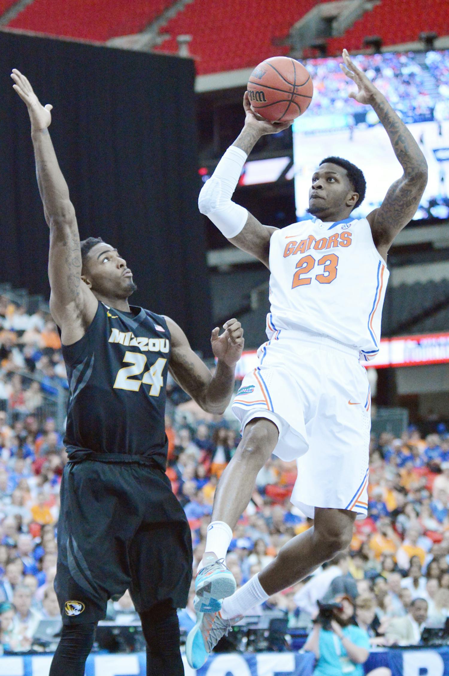 Chris Walker attempts a layup during Florida’s 72-49 win against Missouri on March 14 in the Georgia Dome in Atlanta.