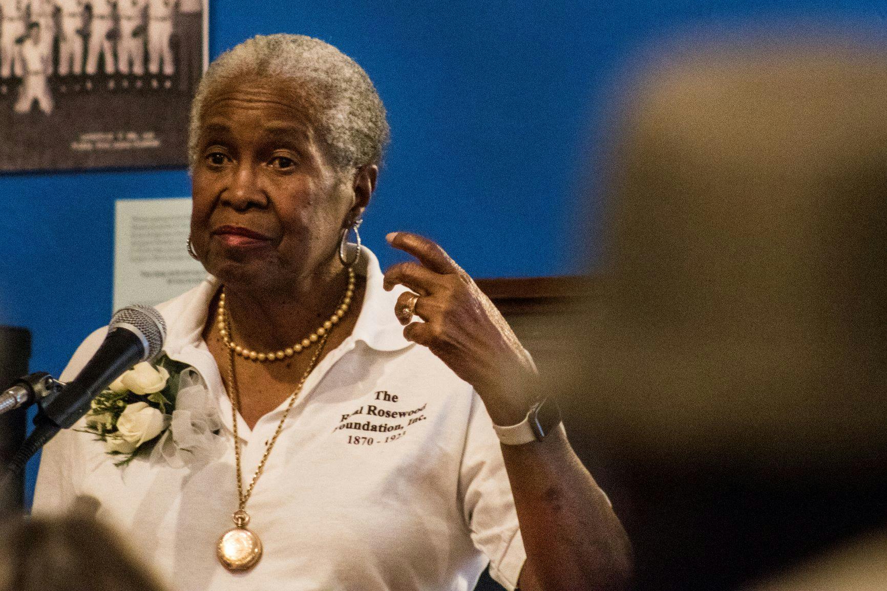 Lizzie Jenkins, the author of the 1998 book “The Real Rosewood,” speaks Thursday to a crowd of about 85 people at the Matheson History Museum. Jenkins spoke about her aunt who was assaulted during the 1923 Rosewood Massacre as well as her own experiences with racism during the civil rights movement. “What happened to me,” Jenkins said, “I don’t want it to happen to anybody else.”