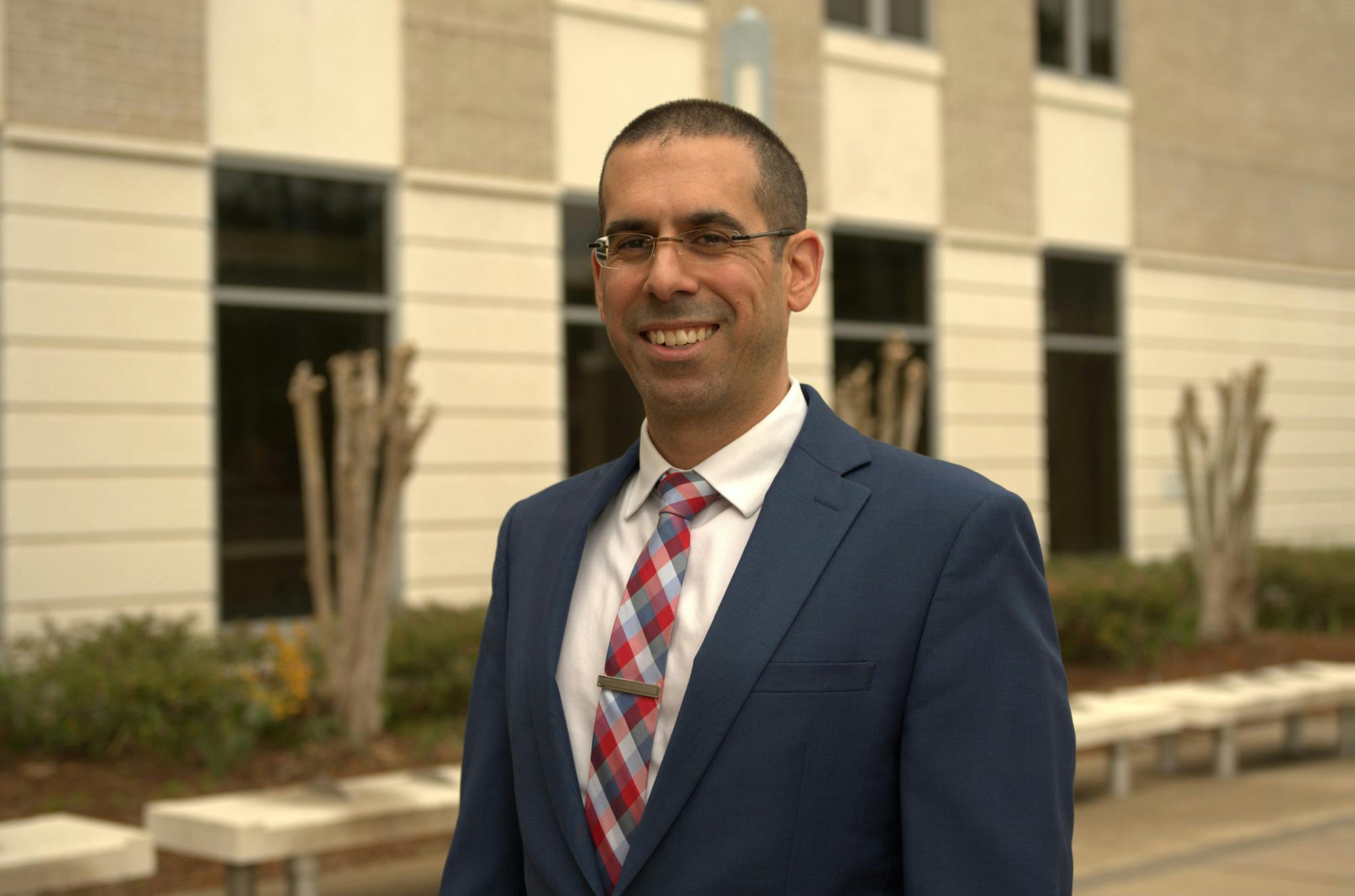 Eric Atria stands in front of the Judge Stephan P. Mickle, Sr. Criminal Courthouse on Saturday, Jan. 6, 2024. 