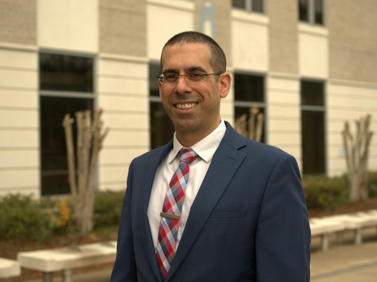 Eric Atria stands in front of the Judge Stephan P. Mickle, Sr. Criminal Courthouse on Saturday, Jan. 6, 2024.