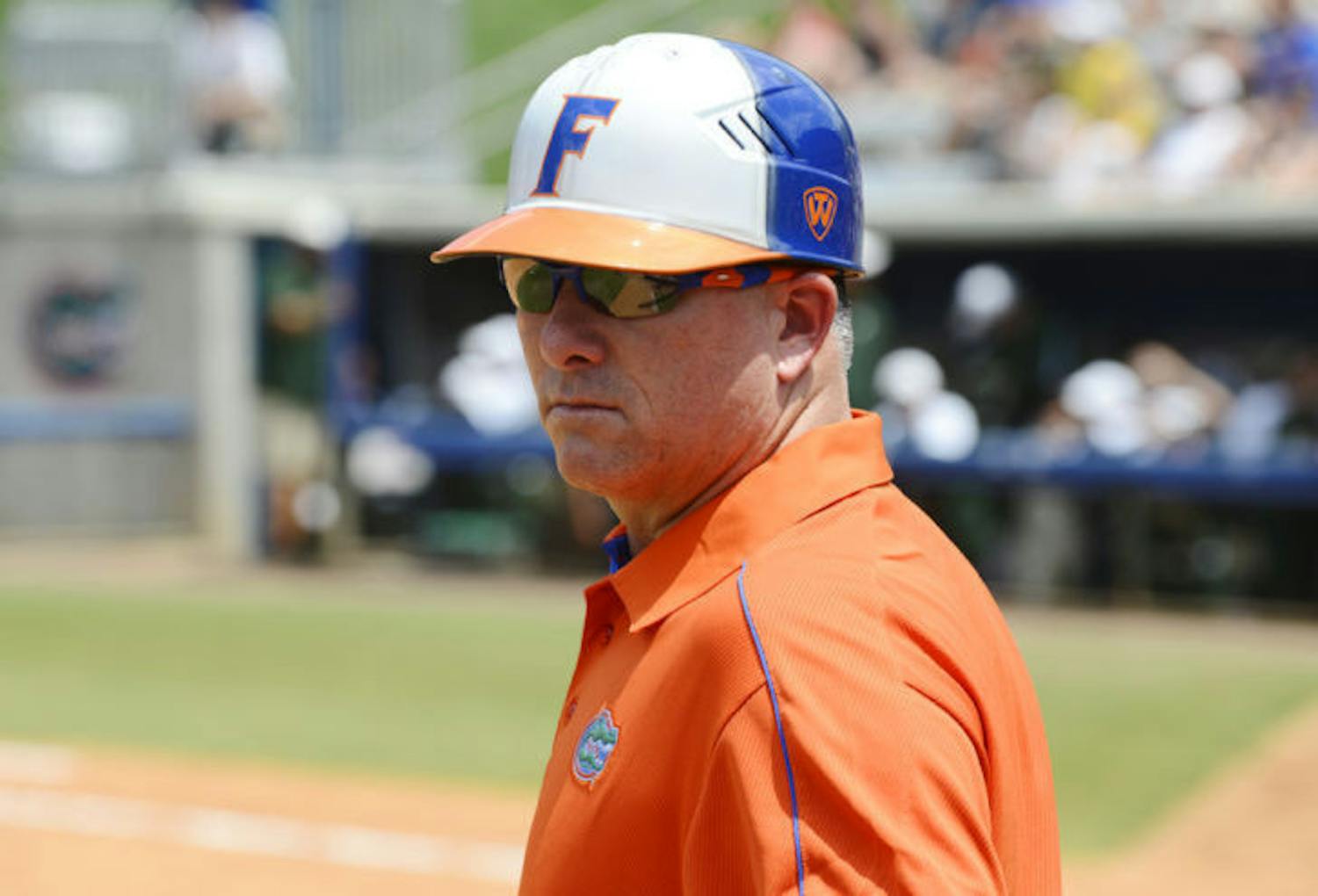 Tim Walton studies the field during Florida’s 11-1 win against USF on May 18, 2013, at Katie Seashole Pressly Stadium. Walton and the Gators open play in the Women's College World Series against Baylor at noon.