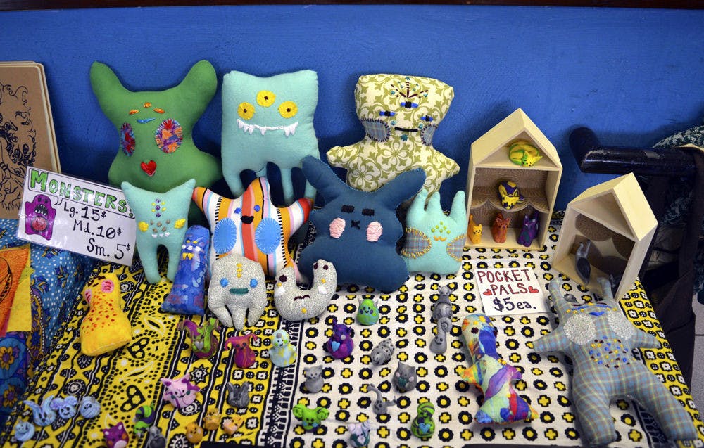 Various vendors displayed their handmade pieces of art for sale at at the Midnight's Big Fat Rummage Sale on Jan. 23, 2016.