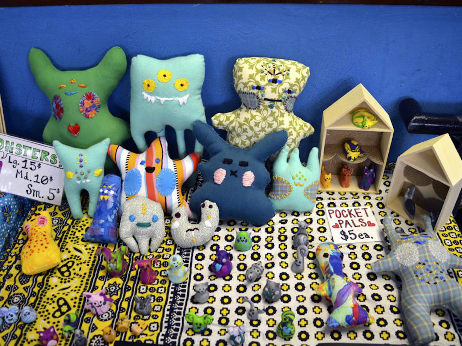 Various vendors displayed their handmade pieces of art for sale at at the Midnight's Big Fat Rummage Sale on Jan. 23, 2016.