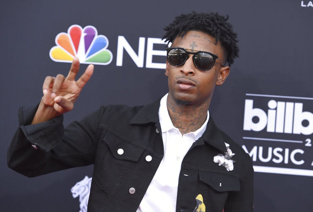 <p>FILE - In this Sunday, May 20, 2018, file photo, 21 Savage arrives at the Billboard Music Awards at the MGM Grand Garden Arena in Las Vegas. It was a shock for fans when 21 Savage was taken into custody Sunday, Feb. 3, 2019, by U.S. immigration agents in Georgia. It was an even bigger shock to learn he had been an immigrant in the first place. (Photo by Jordan Strauss/Invision/AP, File)</p>