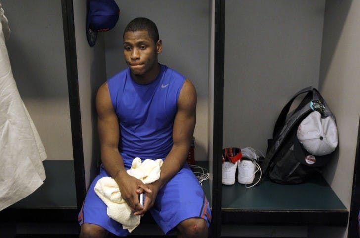 Senior Erving Walker overcame his 5-foot-8 stature and a crowded backcourt to finish as UF’s career leader in assists with 547. He recorded 12 points and seven assists in his final game, Saturday’s Elite Eight loss to Louisville.