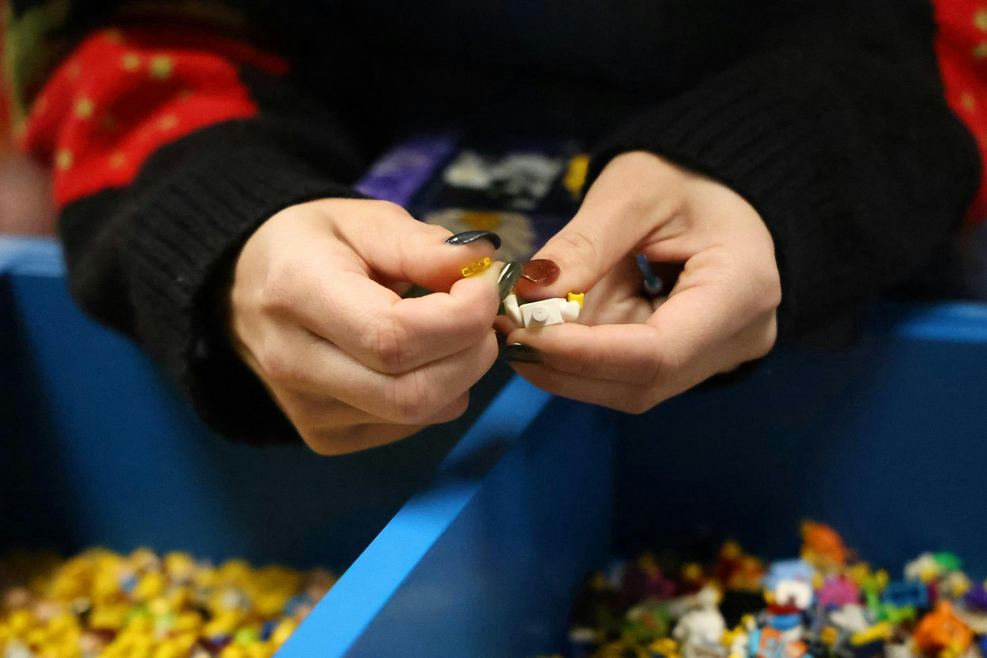 
Customers put together Lego figures of themselves at the grand opening of Bricks & Minifigs in Gainesville, Fla., Saturday, Jan. 31, 2026. 