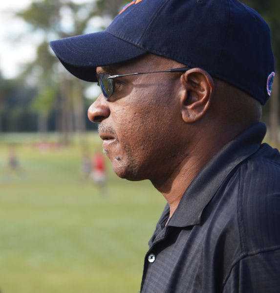 Mike Holloway looks on during the Southeastern Conference Cross Country Championships on Nov. 1, 2013, at the Mark Bostick Golf Course.