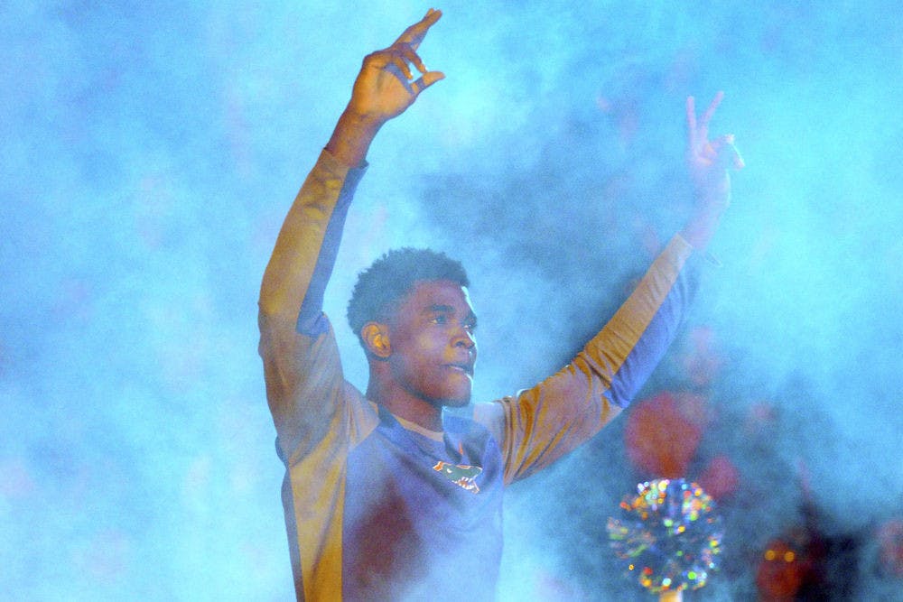 UF center John Egbunu walks onto the O'Connell Center court during Gators Madness on Oct. 2, 2015.