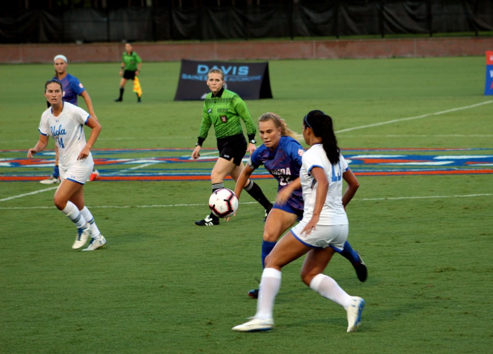 <p>Junior midfielder Parker Roberts (22) will lead the Gators (2-3-1) into a weekend with games against Florida State and Central Florida, calling it a "battle of the states."</p>