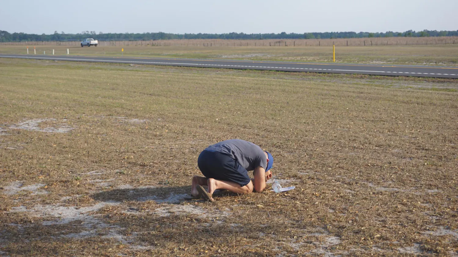Paul Nickerson falls to the ground in prayer outside the Florida State Prison in Raiford, Fla., Tuesday, April 21, 2026.