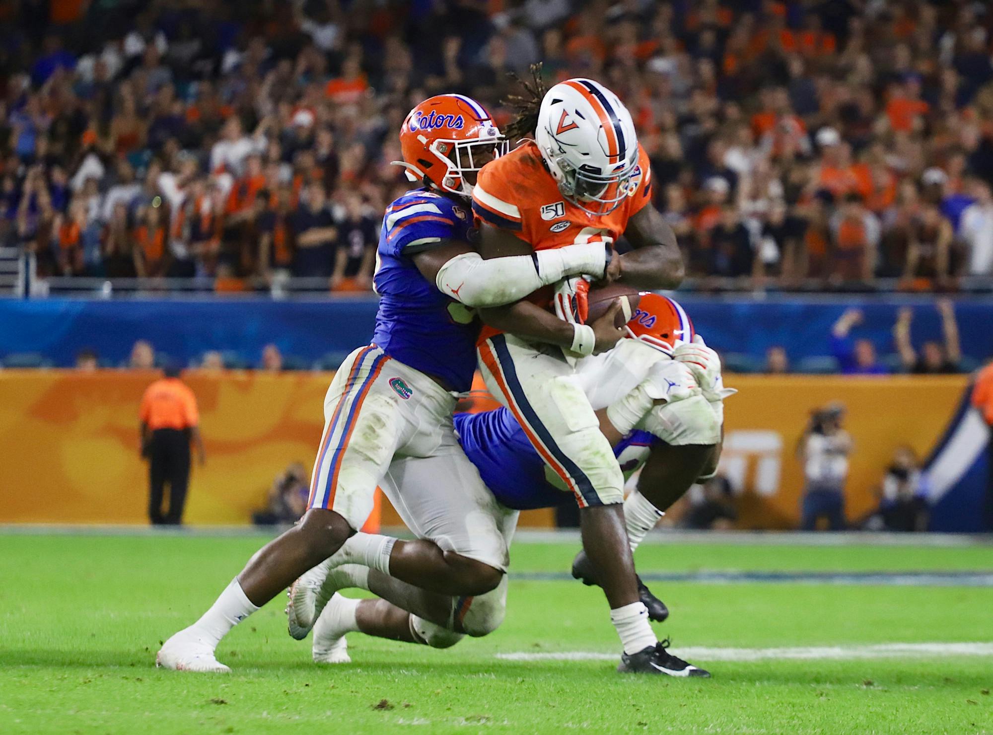 McGriff’s experience coaching in the defensive backfield will be welcomed as the Gator defense allowed 257 yards per game through the air last season. Photo from UF-Virginia game in December 2019. 
