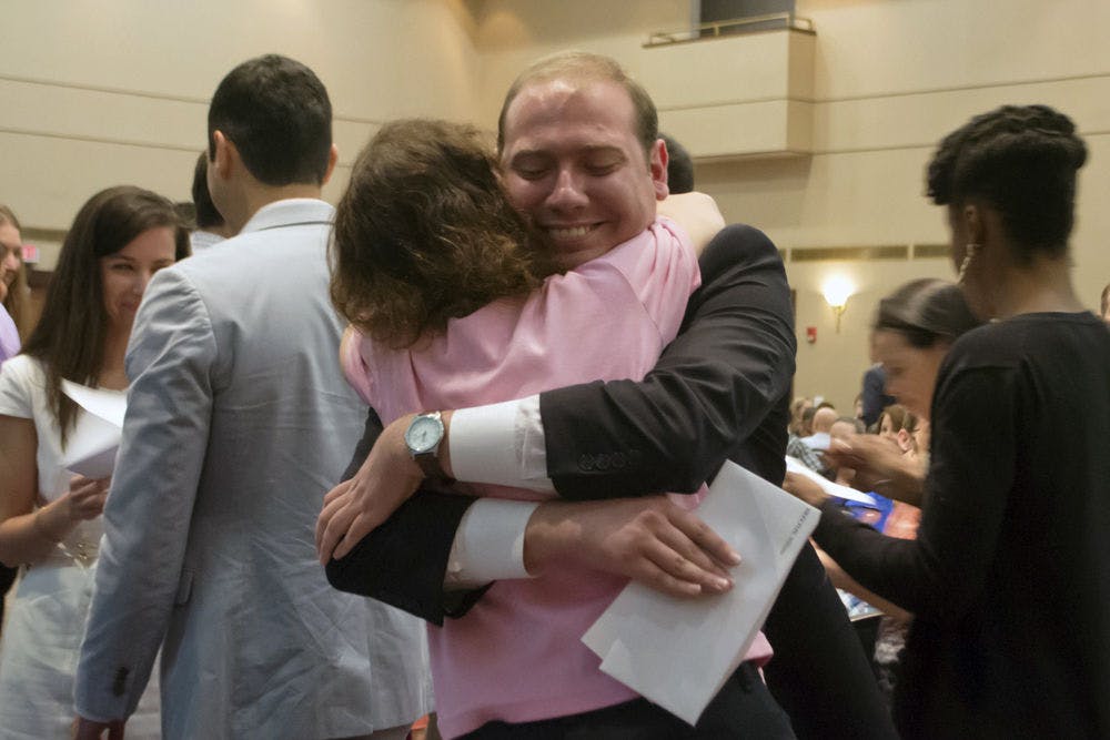 <p>Paul Skelton, a fourth-year UF medical student, embraces his mother, Dr. Nadine Skelton, after finding out the National Resident Matching Program results at UF College of Medicine's annual Match Day. Skelton was matched at the University of Florida for internal medicine. UF was his first-choice residency program.</p>