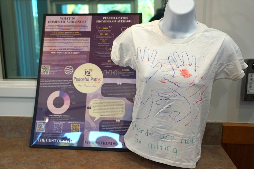 A t-shirt decorated by a survivor of domestic violence is displayed in the lobby of the Alachua Police Department on Saturday, Oct. 28, 2023. 