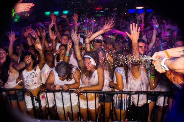 UF students and Gainesville residents dance Sept. 13 at NeoCloud, a powder paint party hosted at Forum.