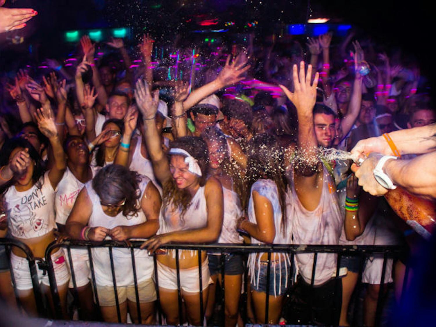 UF students and Gainesville residents dance Sept. 13 at NeoCloud, a powder paint party hosted at Forum.