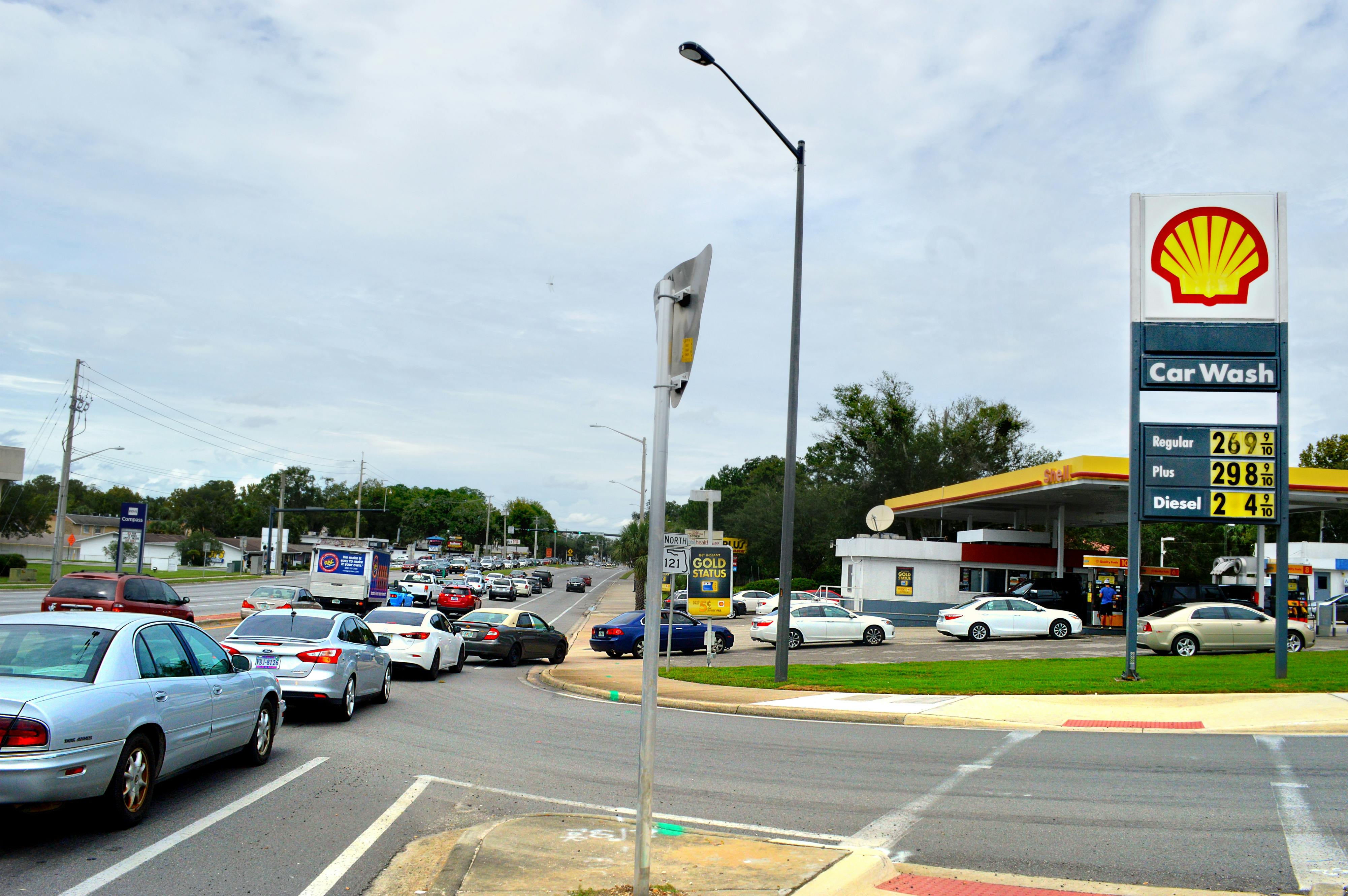 The Shell gas station on Archer Road experiences backups extending into traffic lanes as Gainesville locals attempt to fill up their tanks before experiencing the potential effects of Hurricane Irma.