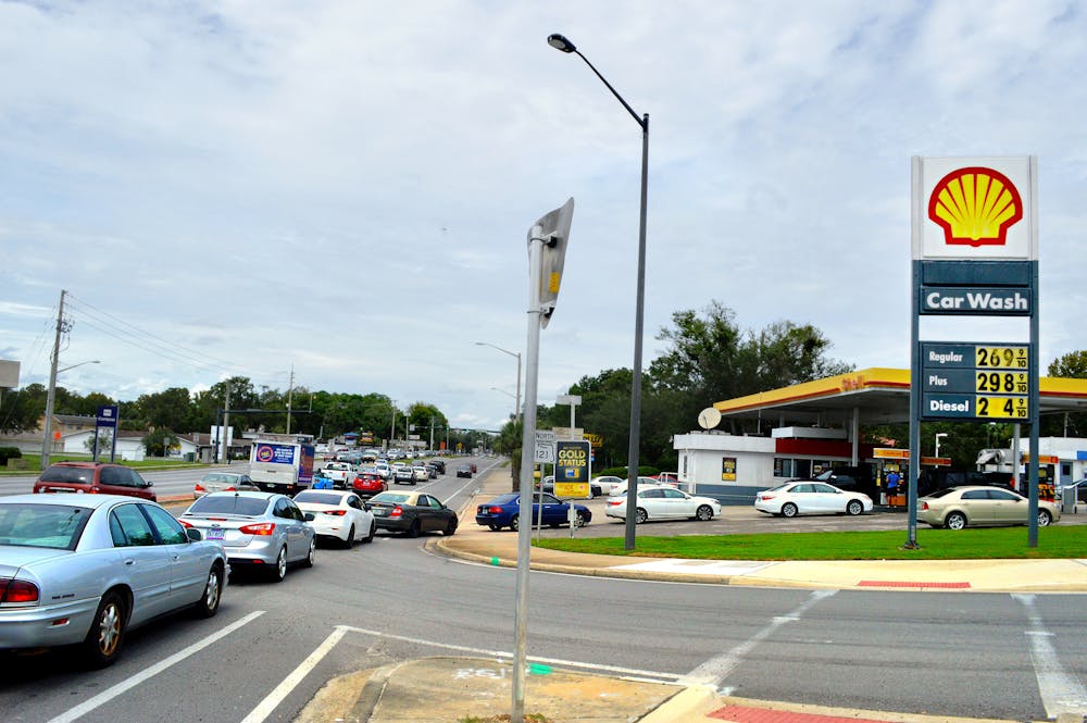 <p><span>The Shell gas station on Archer Road experiences backups extending into traffic lanes as Gainesville locals attempt to fill up their tanks before experiencing the potential effects of Hurricane Irma.</span></p>