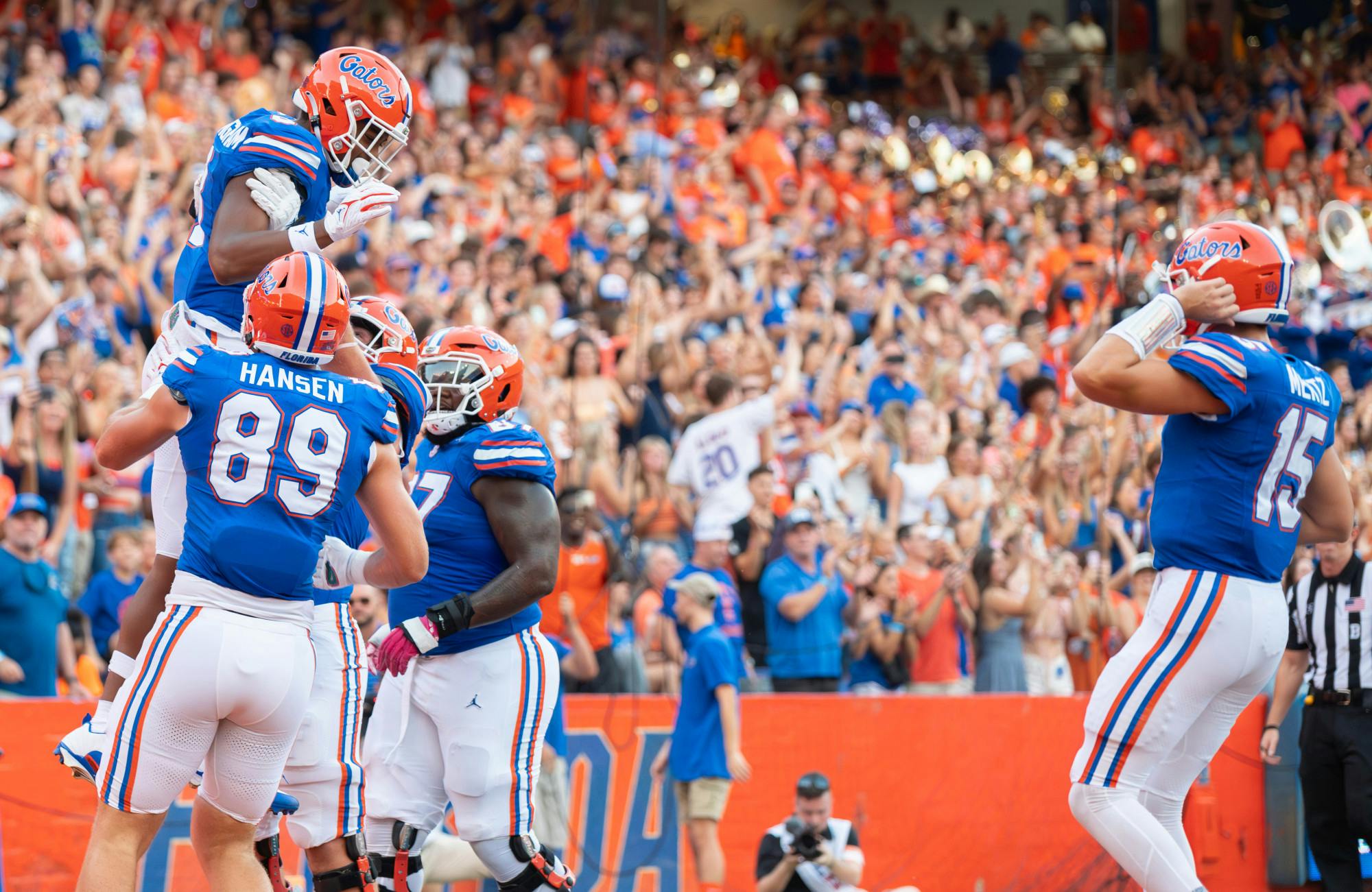 Redshirt freshman tight end Arlis Boardingham celebrates his first career touchdown with his teammates in the Gators’ 22-7 win against the Charlotte 49ers on Sunday, Sept. 24, 2023. 