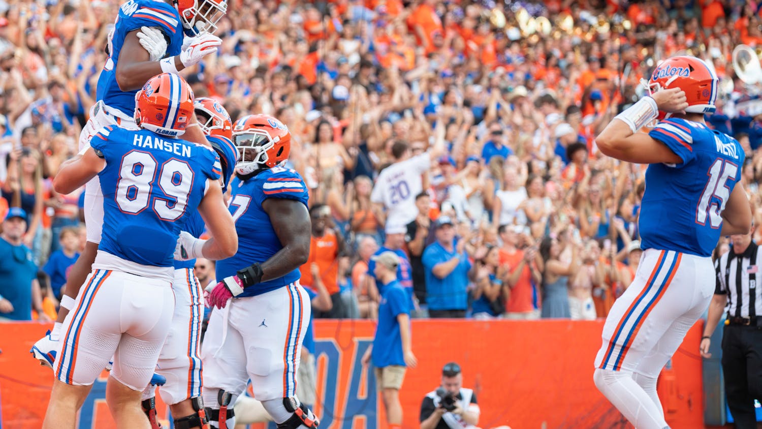 Redshirt freshman tight end Arlis Boardingham celebrates his first career touchdown with his teammates in the Gators’ 22-7 win against the Charlotte 49ers on Sunday, Sept. 24, 2023. 