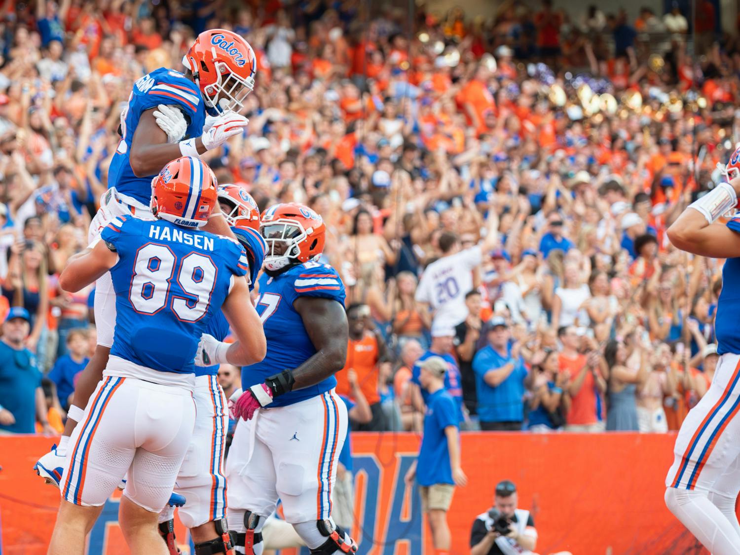 Redshirt freshman tight end Arlis Boardingham celebrates his first career touchdown with his teammates in the Gators’ 22-7 win against the Charlotte 49ers on Sunday, Sept. 24, 2023. 
