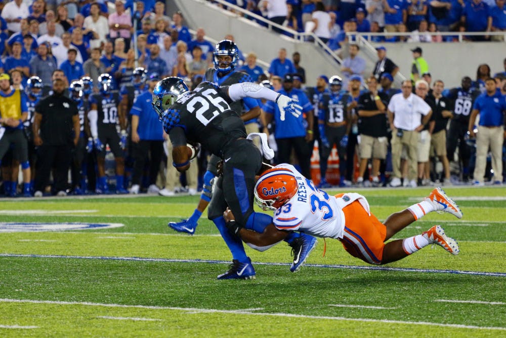 <p>UF linebacker David Reese tackles a Kentucky player during Florida's 28-27 win against the Wildcats on Sept. 23, 2017.</p>