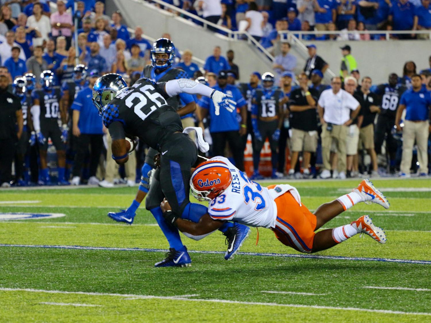 UF linebacker David Reese tackles a Kentucky player during Florida's 28-27 win against the Wildcats on Sept. 23, 2017.