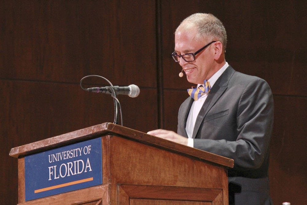 <p>Jim Obergefell smiles after retelling his experience in the federal marriage equality court case Obergefell v. Hodges to an audience in the university auditorium on Oct. 14, 2015. Obergefell, the lead plaintiff in the case, remembered ignoring the dissenting opinion when the Supreme Court ruled in his favor.</p>
