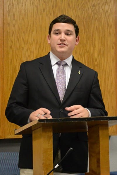 Senate President Micah Lewis had to quiet senators several times during Tuesday's Senate meeting. Senators debated whether to transfer reserve funds to SG Cabinet for cellphone charging stations in six high-traffic campus locations.