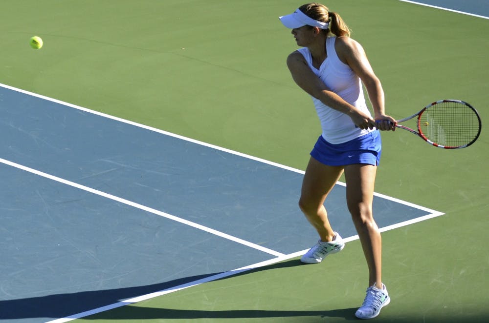 <p>Belinda Woolcock prepares to swing during the second day of the Bedford Cup on Oct. 11 at the Ring Tennis Complex.</p>