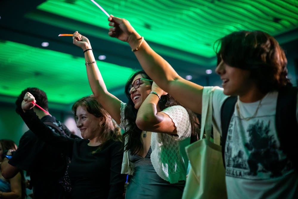 Marcela Sandino enjoys a set by the Nancys band during the Hispanic-Latine Student Assembly at the Reitz Union Grand Ballroom on Wednesday, Aug. 27, 2025.