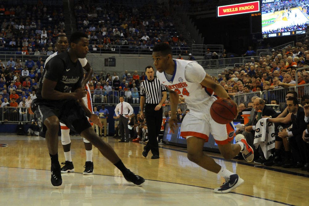 <p>Florida forward Justin Leon drives into the paint during UF's 87-84 loss to Vanderbilt on Feb. 23, 2016 in the O'Connell Center.</p>