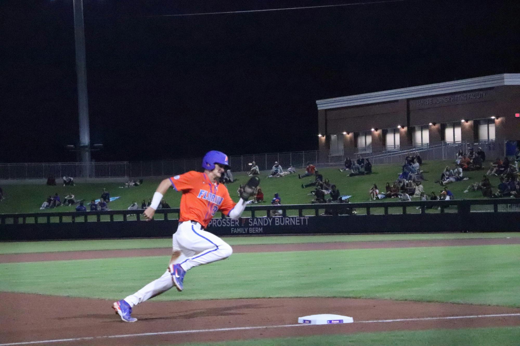 Freshman Deric Fabian rounds third base and sprints for home during a midweek matchup with Florida A&amp;M. Fabian hit his third home run of the season on Tuesday night against Florida A&amp;M. The third baseman knocked a solo walk-off to survive the series in Vanderbilt