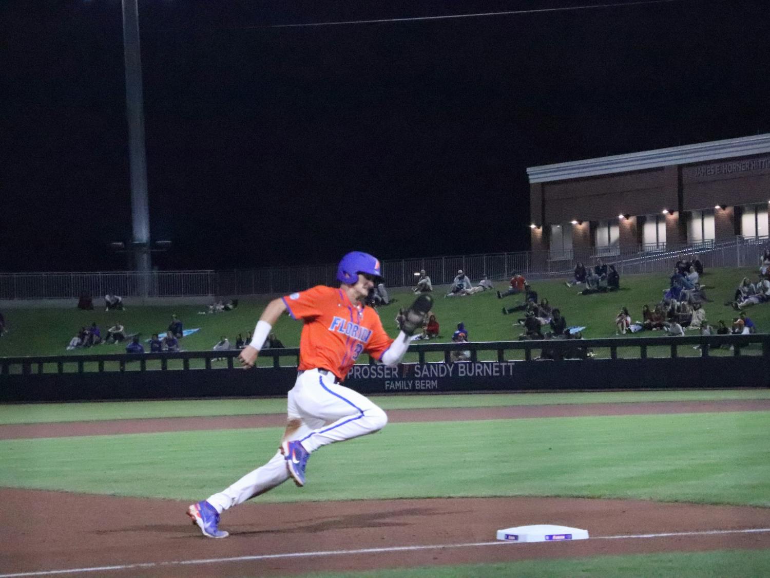 Freshman Deric Fabian rounds third base and sprints for home during a midweek matchup with Florida A&amp;M. Fabian hit his third home run of the season on Tuesday night against Florida A&amp;M. The third baseman knocked a solo walk-off to survive the series in Vanderbilt