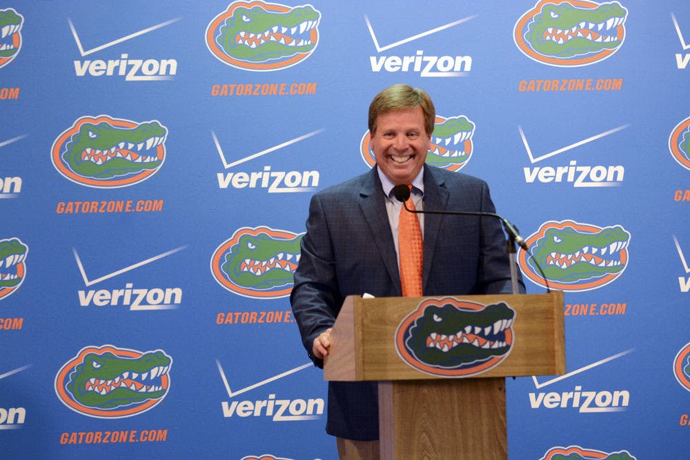 <p>UF football coach Jim McElwain speaks during UF Media Day on Aug. 5 at Touchdown Terrace in Ben Hill Griffin Stadium.</p>