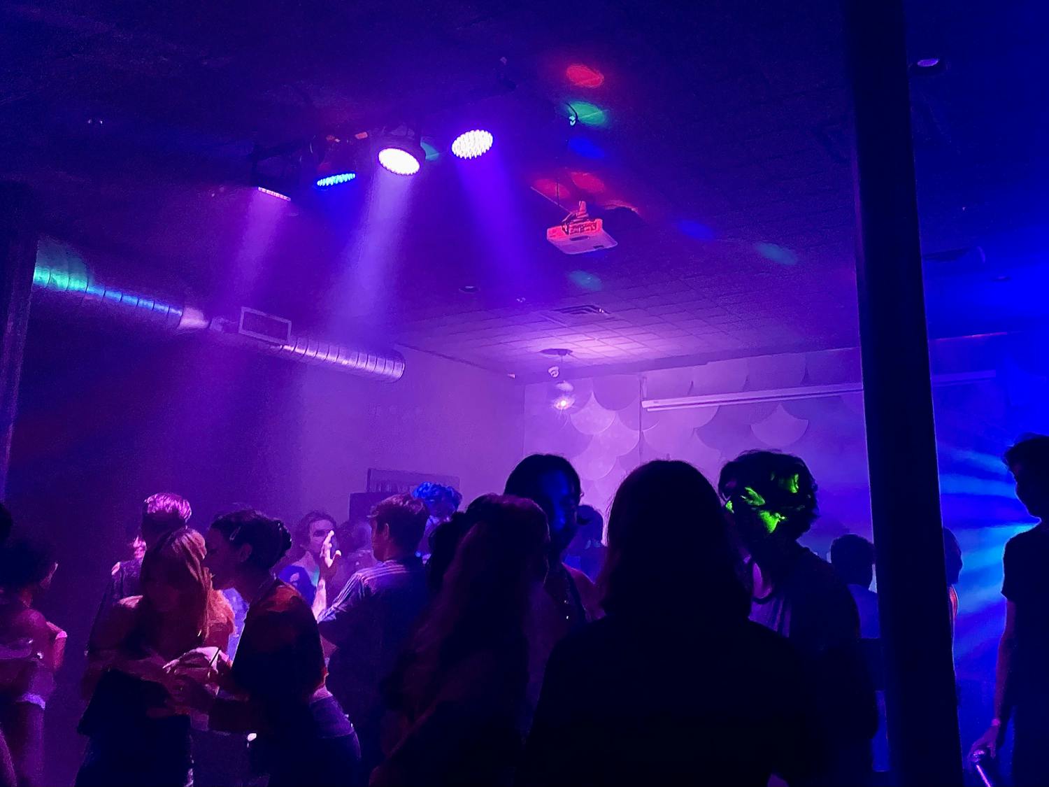 Patrons gather on the strobe-lit dance floor during The Wooly&#x27;s SOPHIE tribute, held Oct. 15.
