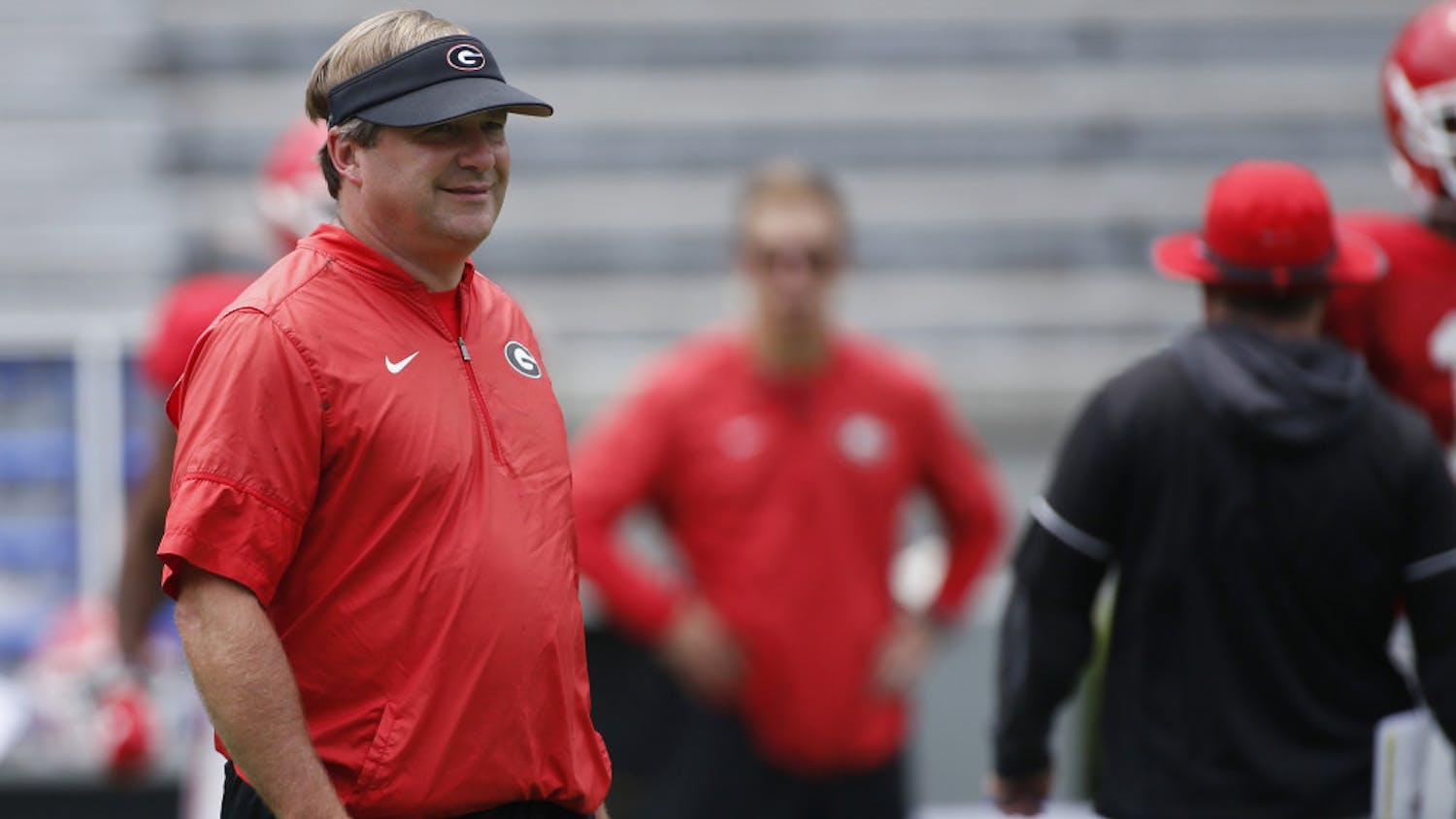 Georgia coach Kirby Smart looks on during an NCAA college football practice at Sanford Stadium in Athens, Ga., Saturday, Aug. 10, 2019.