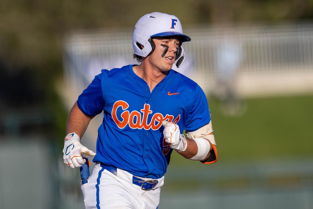 Florida infielder Blake Cyr (5) runs home during an NCAA college baseball game against Auburn at Condron Family Ballpark in Gainesville, Fla., Friday, April 17, 2026.
