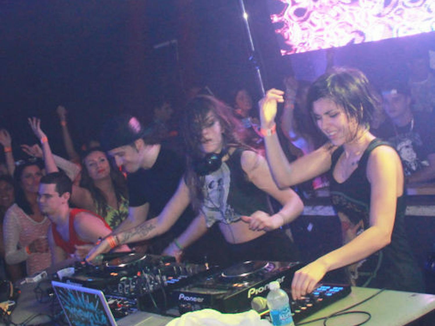 Electronic dance music group Krewella performs at Forum, 233 W. University Ave., Friday. The performance, which drew a crowd of about 1,100 people, was part of its Play Hard Tour.