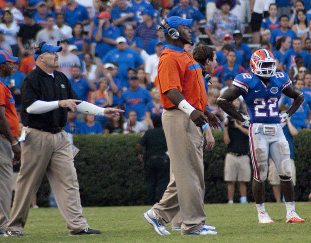 Defensive coordinator Dan Quinn (left) said safety Matt Elam, who is responsible for the defense’s pre-snap adjustments, has taken the next step to becoming a great player