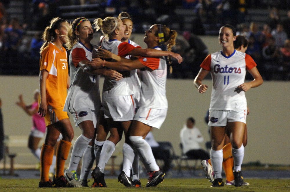 Players celebrate Tessa Andujar's goal during Florida's 3-1 win against Tennessee on Friday at James G. Pressly Stadium.